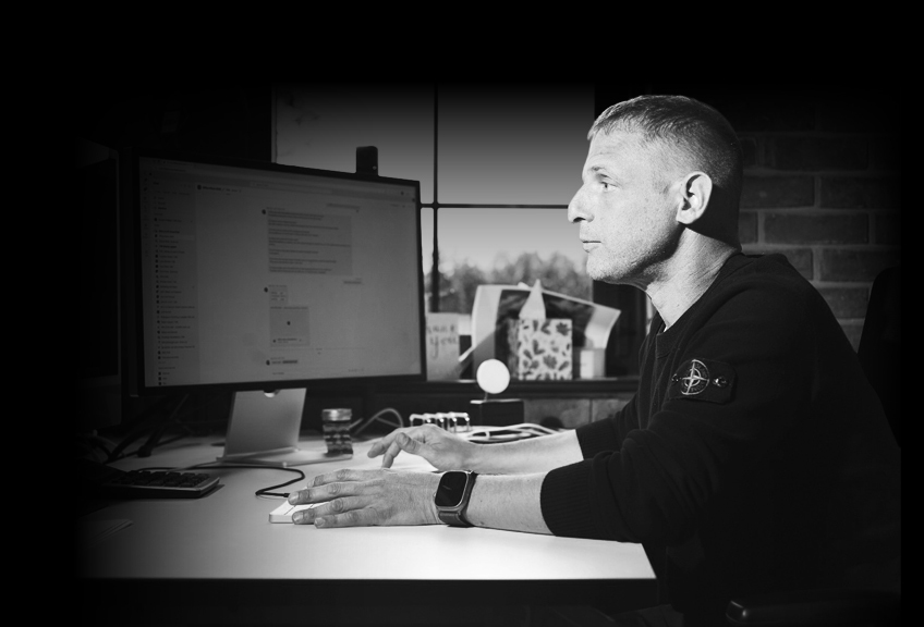 Duncan Kreeger reviewing work on screen at TAB headquarters